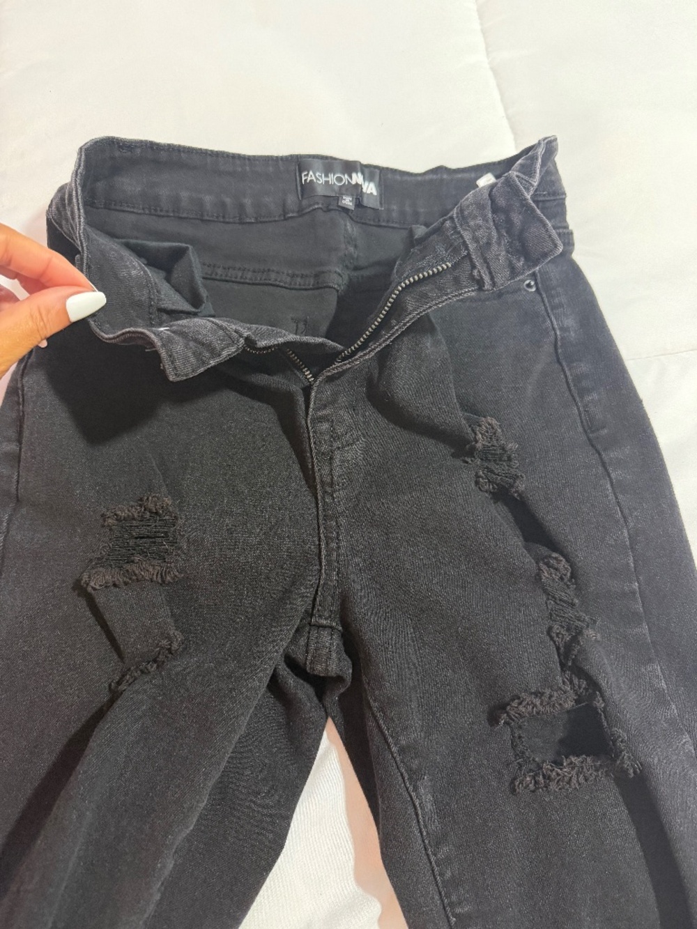 distressed skinny jeans by Fashion Nova